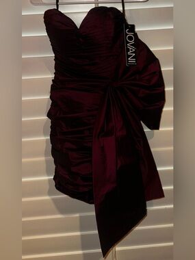 Jovani Deep Burgundy Ruched Satin Mini Skirt with Side Bow Detail